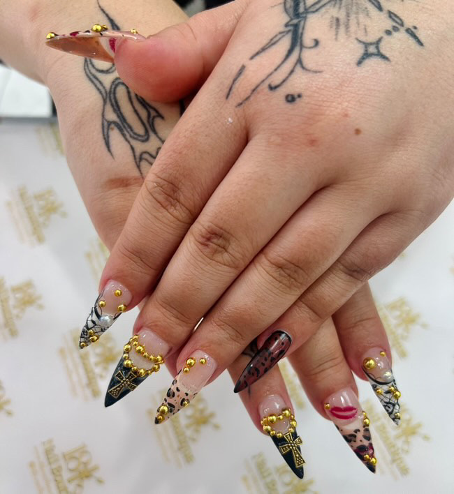 Black and gold studded nail art